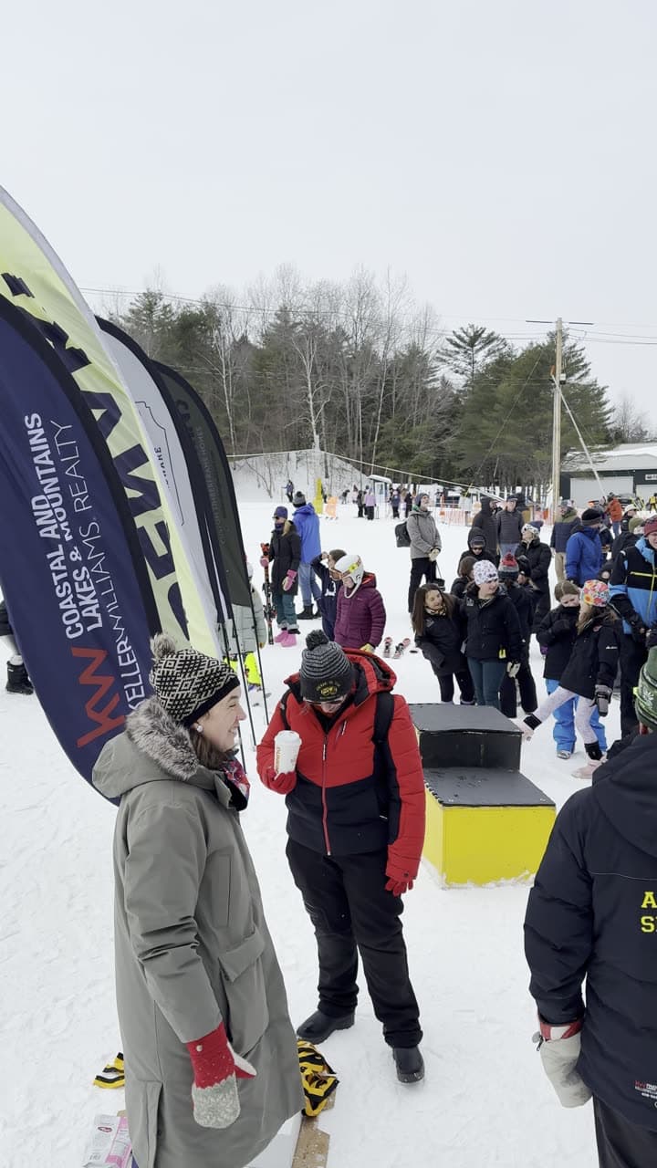 Families gathered at the base of the hill for an awards presentation